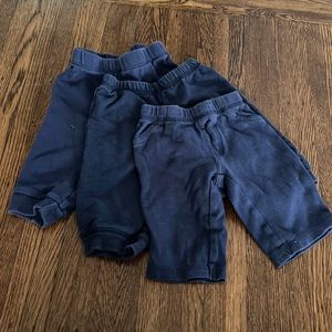 3 navy blue pairs of pants 3 M